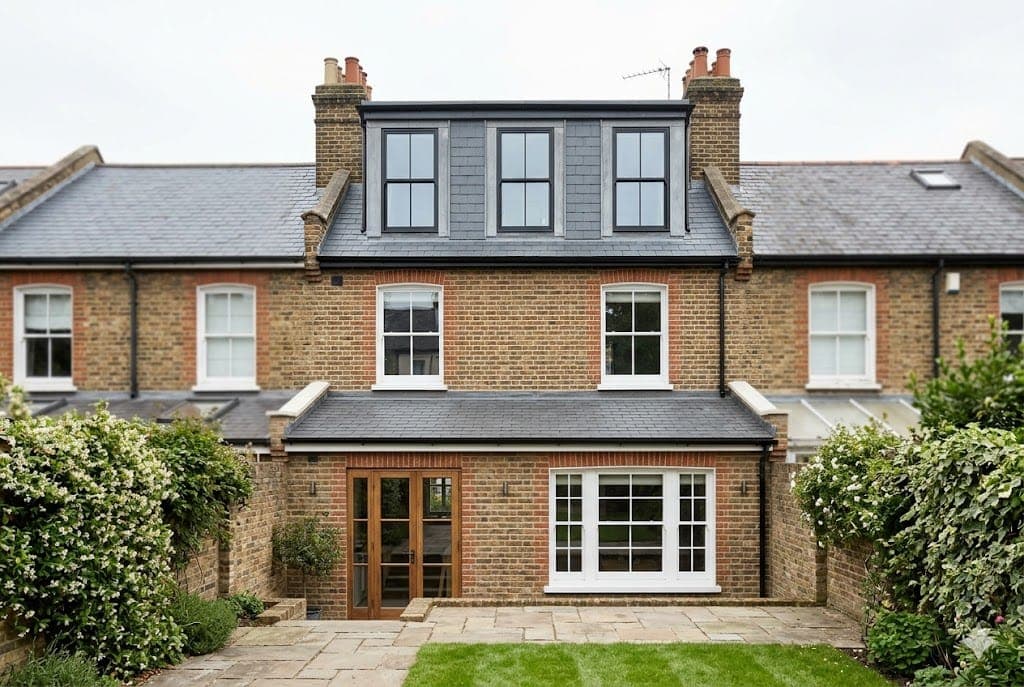 Completed rear dormer loft conversion with full standing headroom and built-in storage